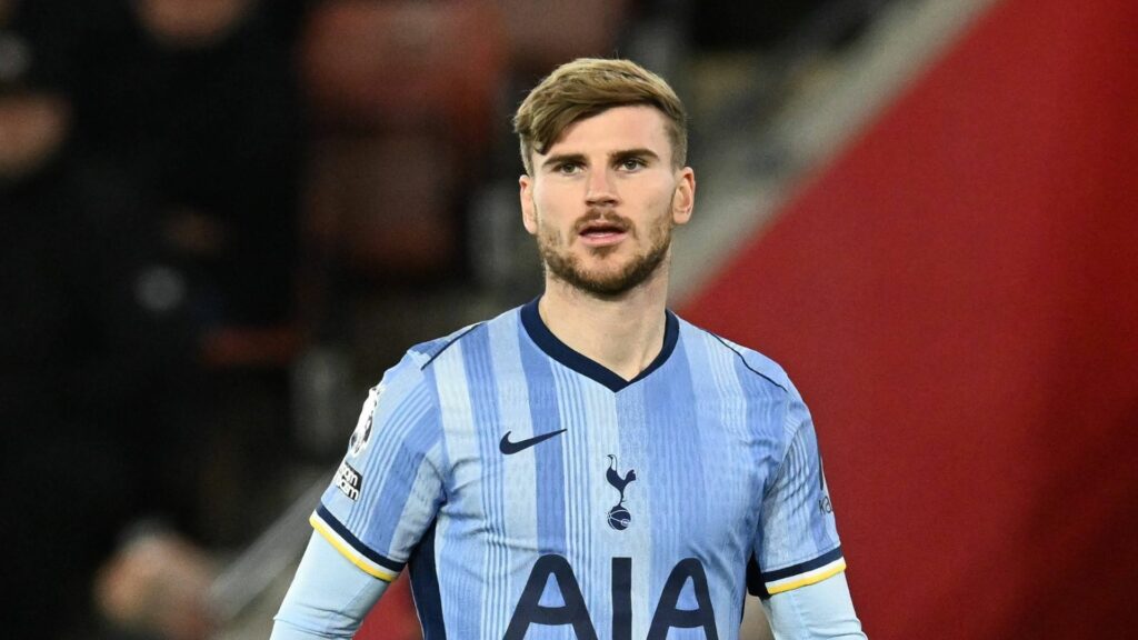 Timo Werner playing in Tottenham's away kit.
