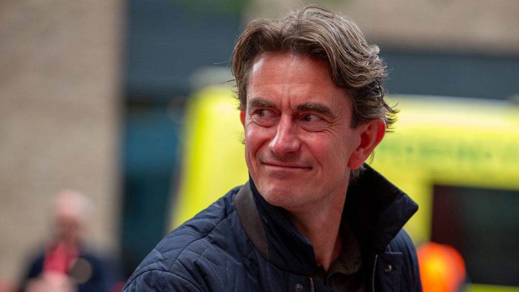 Tottenham manager Thomas Frank looking happy