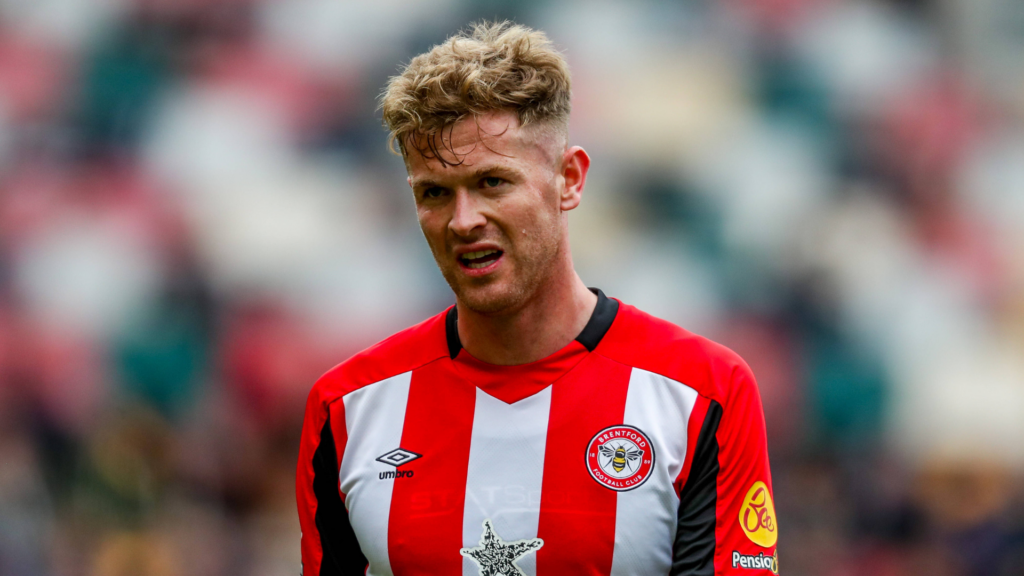 Tottenham target Nathan Collins stares into the distance during a game for Brentford.
