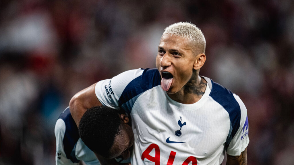 Tottenham star Richarlison with his tongue out.
