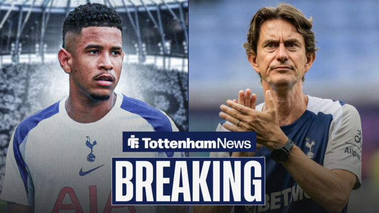 Breaking News as Tottenham manager Thomas Frank applauds Savinho with a stern expression on his face.