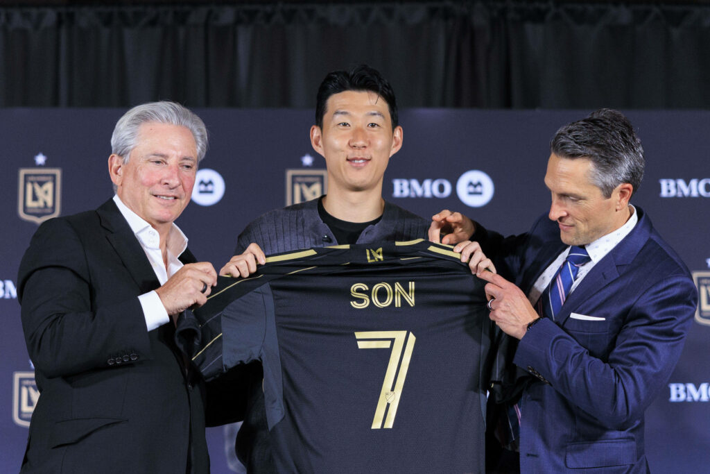 Son Heung-min holds up the LAFC shirt after leaving Tottenham.