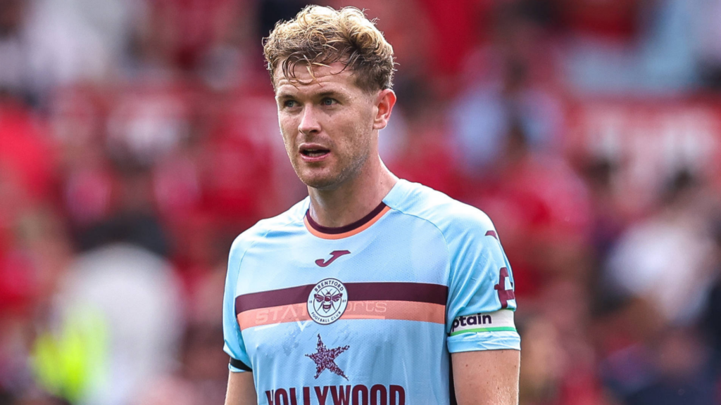 Tottenham target Nathan Collins stares into the distance during a game for Brentford.