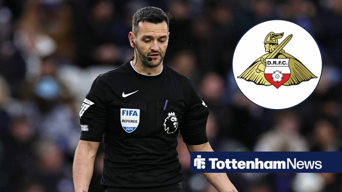 Andy Madley looks down with the Doncaster Rovers badge in a circular inset.