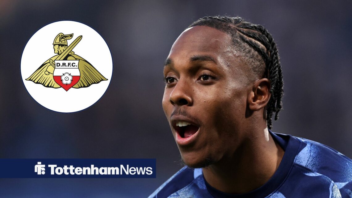 Mathys Tel open mouthed looking at the Doncaster Rovers badge in a circular inset.