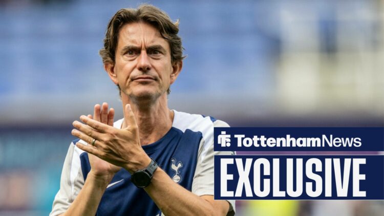 Thomas Frank applauds the Tottenham supporters.