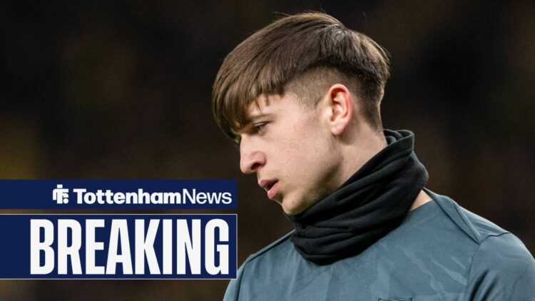 Mikey Moore looks deflated in Tottenham training kit.