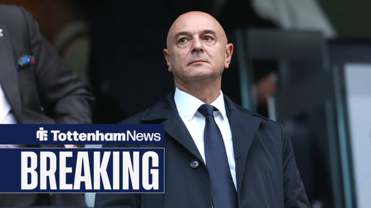 Daniel Levy stannds in a suit while Tottenham chairman