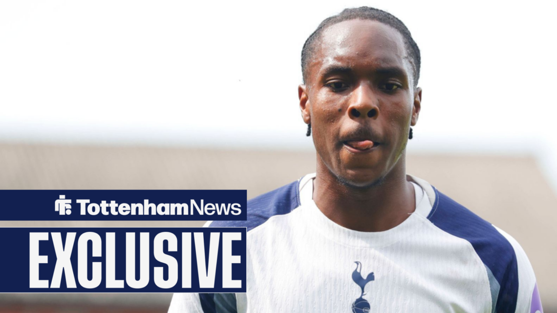 Mathys Tel looks frustrated with his tongue out in Tottenham home shirt