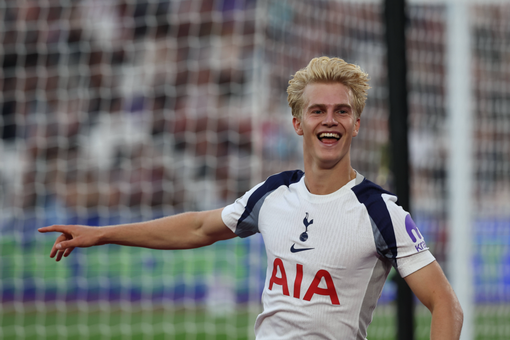 Lucas Bergvall smiling while in action for Tottenham