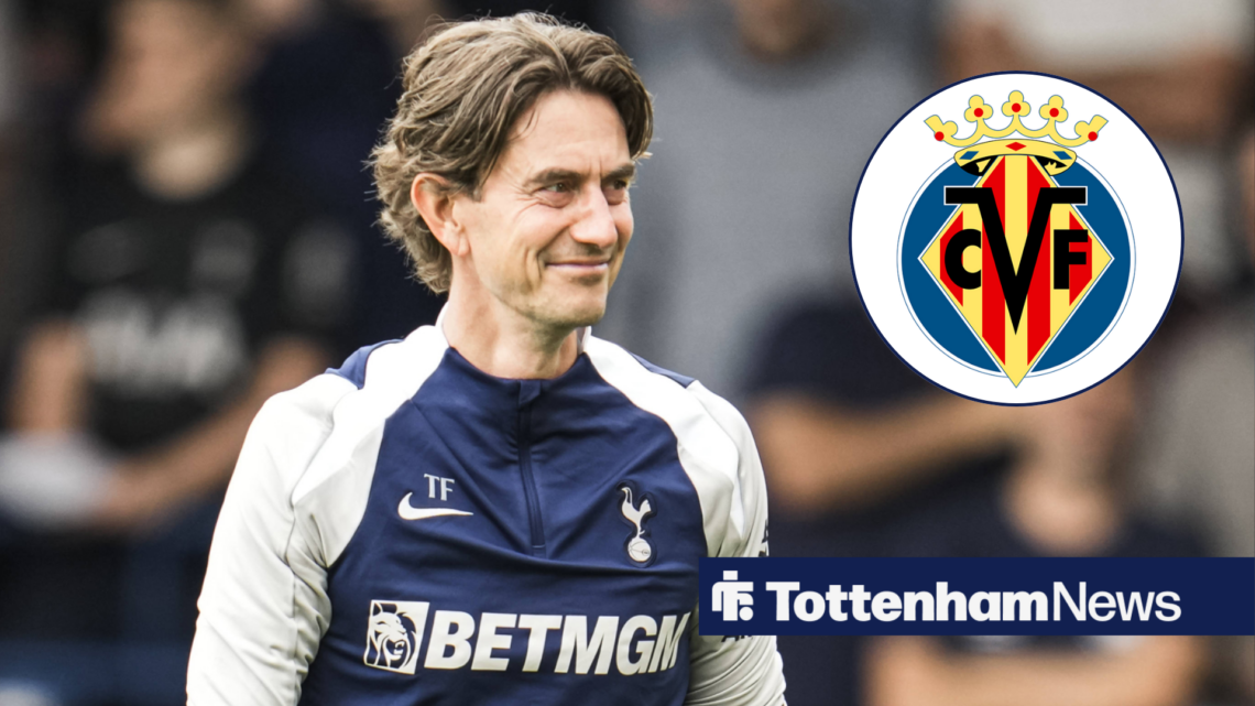 Tottenham manager Thomas Frank smiles in the direction of the Villarreal badge, which features in a circular inset on the right of the image.