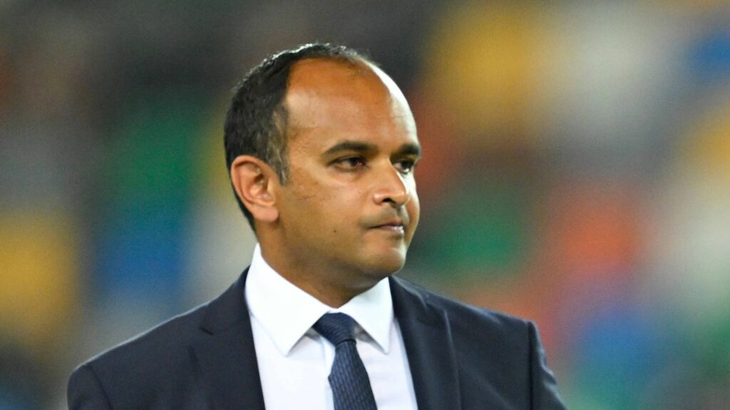 Vinai Venkatesham looks puzzled while wearing a suit.