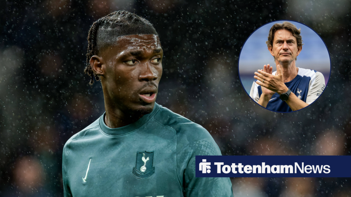Tottenham midfielder Yves Bissouma glances to the right towards manager Thomas Frank, who applauds sternly in a circular inset.