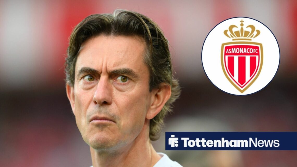 Thomas Frank looking displeased in the direction of AS Monaco badge.