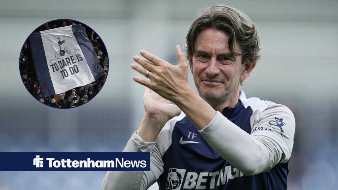 Thomas Frank clapping with Tottenham banner in corner