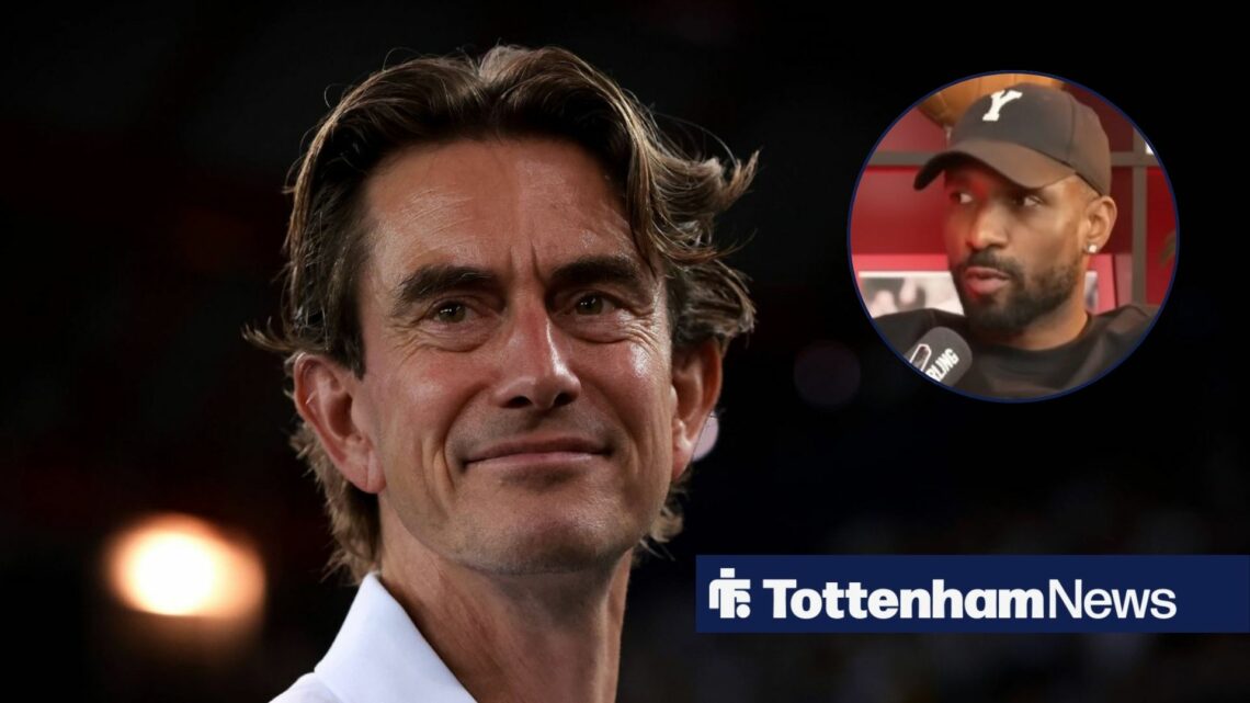 Thomas Frank smiling with Jermaine Defoe looking at him.