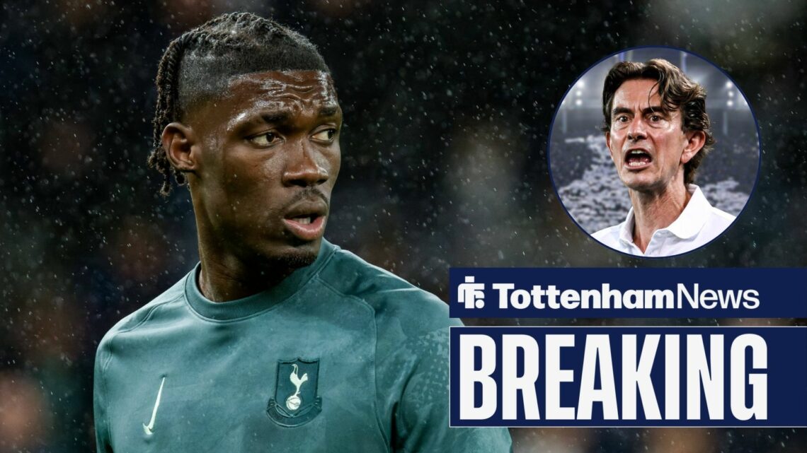 Breaking news as rain falls on Tottenham midfielder Yves Bissouma while he is warming up for a game, as manager Thomas Frank shouts instructions in...