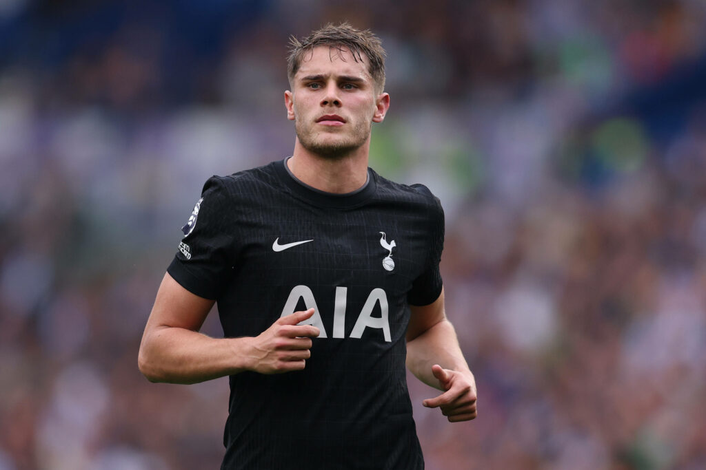 Micky Van de Ven runs for Tottenham.