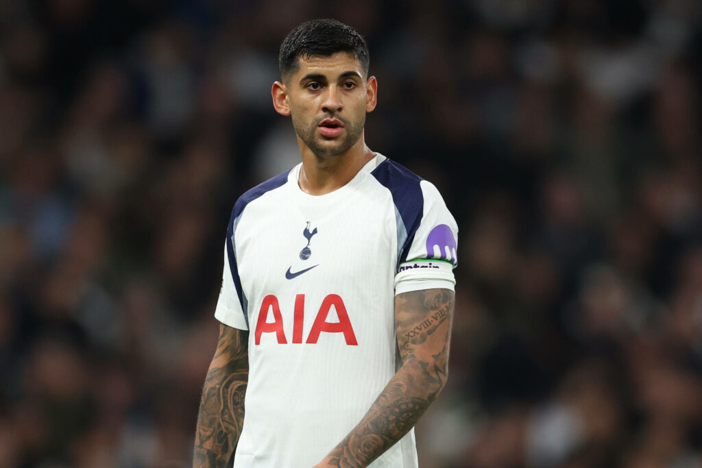 Cristian Romero looks ahead while playing for Tottenham.