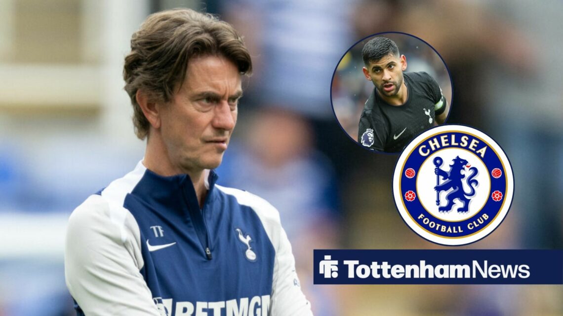 Thomas Frank looking at Cristian Romero and Chelsea badge.