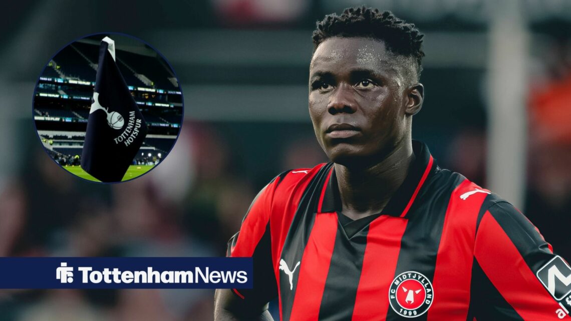 Franculino playing for Midtjylland looking towards a circle inset of a Tottenham flag at the Tottenham Hotspur Stadium