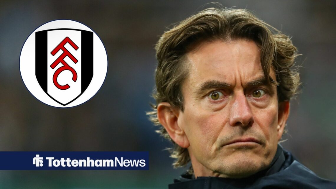 Thomas Frank looking at Fulham badge in circular inset