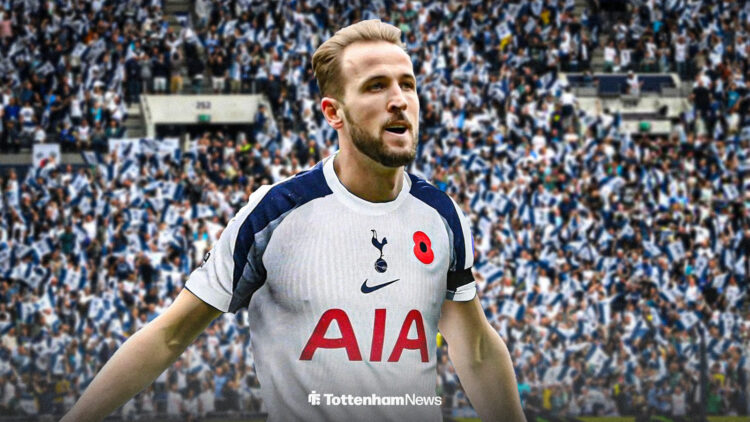 Harry Kane in the 2025-26 Tottenham home kit with Spurs fans behind him.