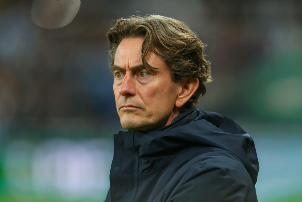 Tottenham boss Thomas Frank looks to his right