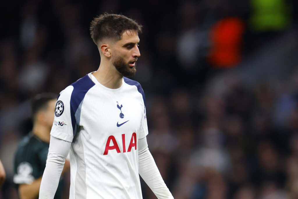 Rodrigo Bentancur stares at the ground during a game for Tottenham.