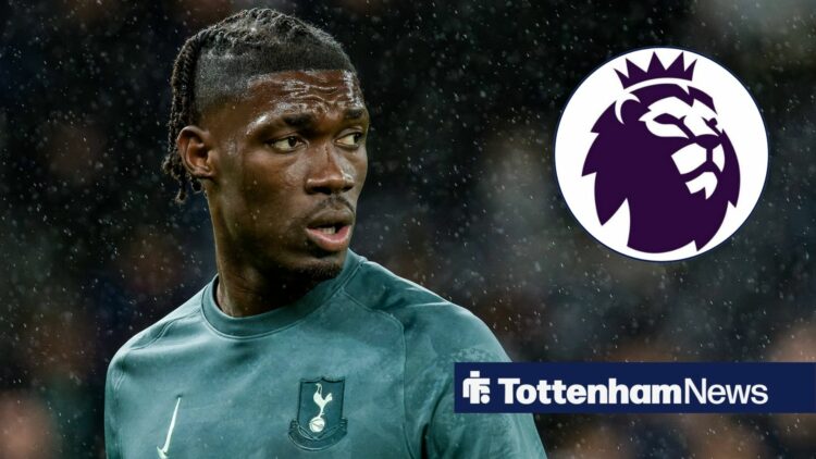 Yves Bissouma looking at the Premier League badge.