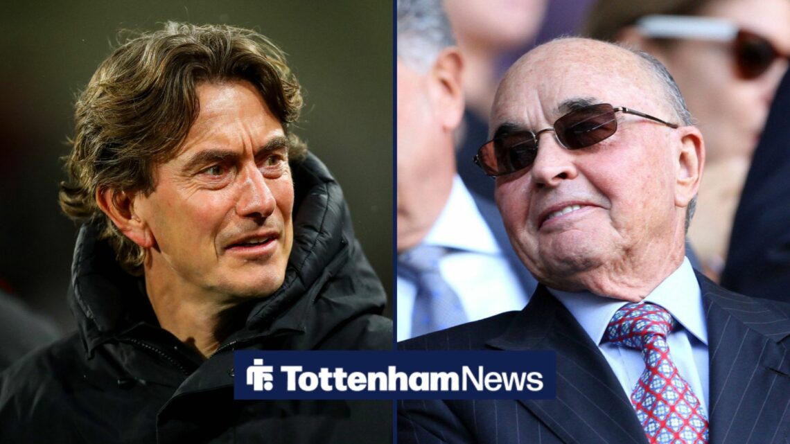 Thomas Frank and Joe Lewis both smiling at one naother.