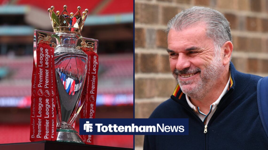 Ange Postecoglou smiling, with the Premier League trophy to the left of him.