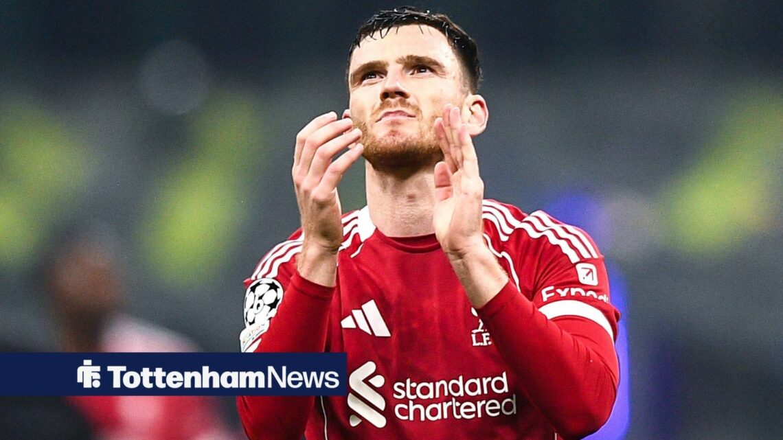 Andy Robertson clapping while playing for Liverpool