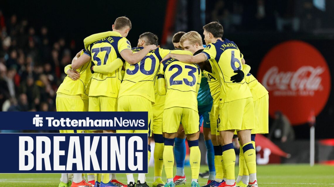 Tottenham players in a huddle.