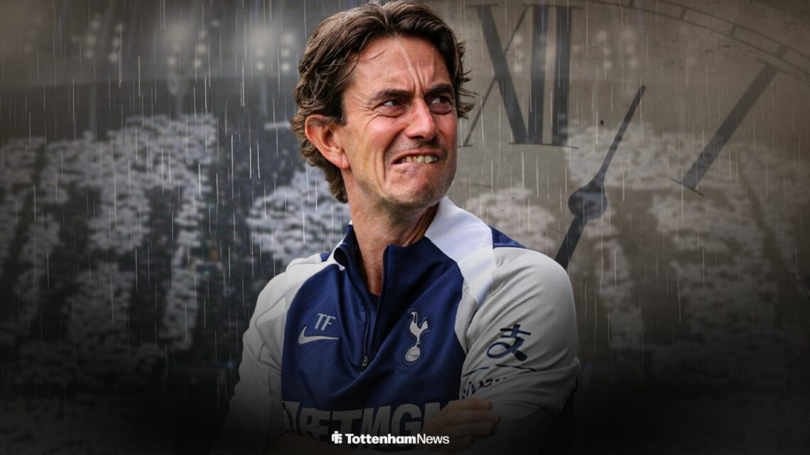 Thomas Frank at the Tottenham Hotspur Stadium looking at a clock face