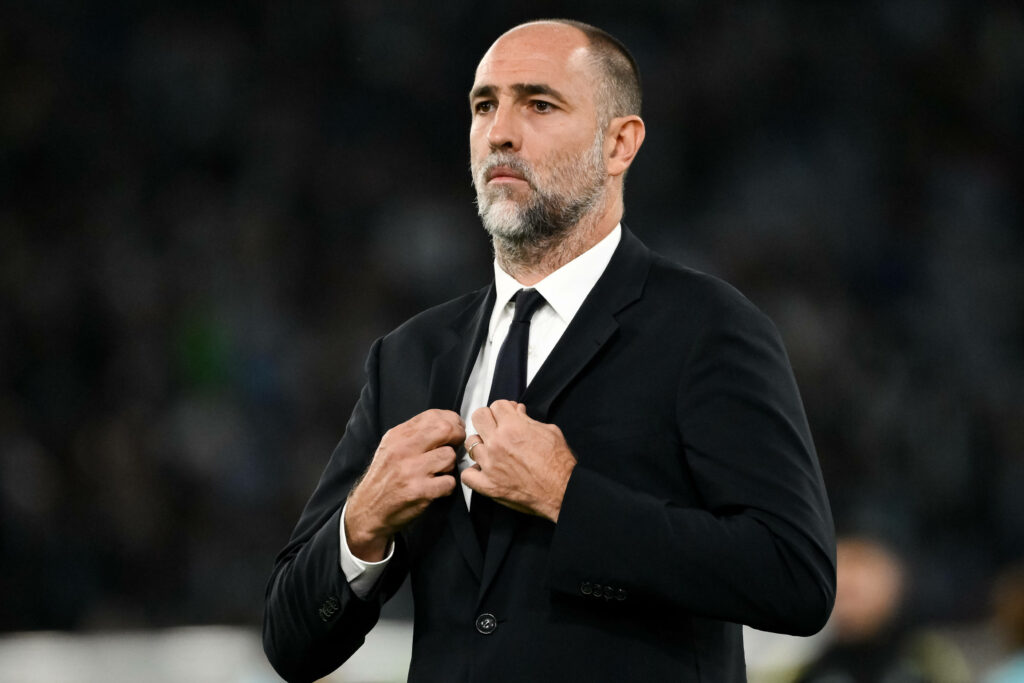 Igor Tudor in charge of Juventus fixing his suit