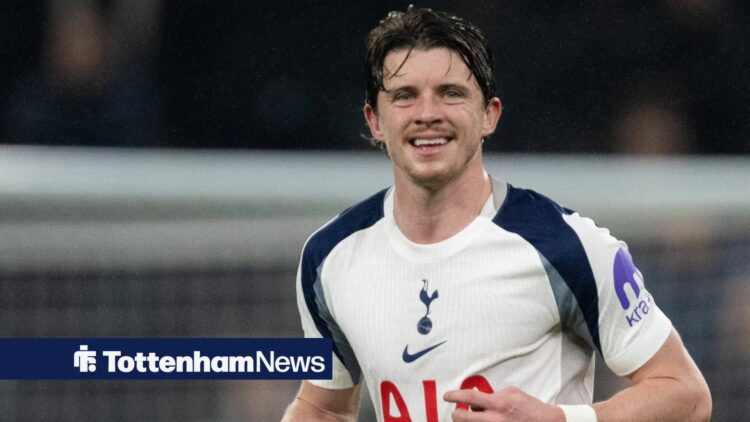 Conor Gallagher running in a Tottenham home kit.