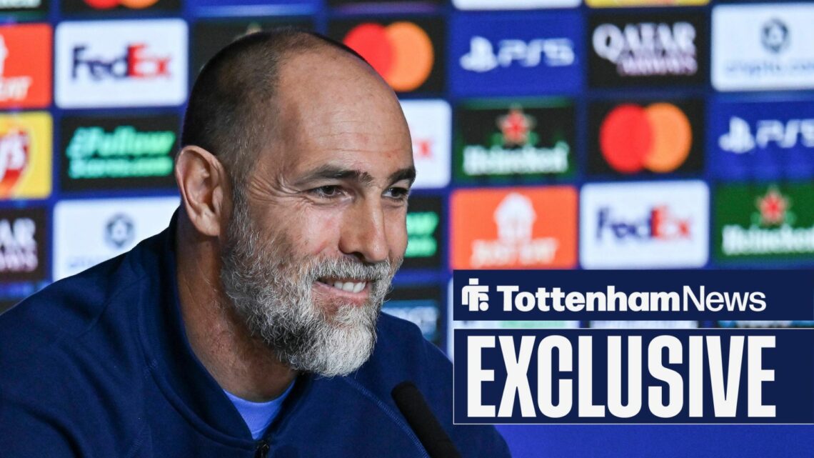 Tottenham boss Igor Tudor smiling in press conference.