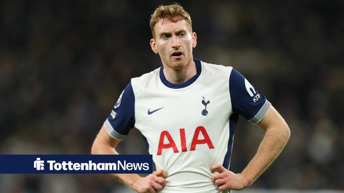 Tottenham star Dejan Kulusevski stands with his stands on his hips during a game.