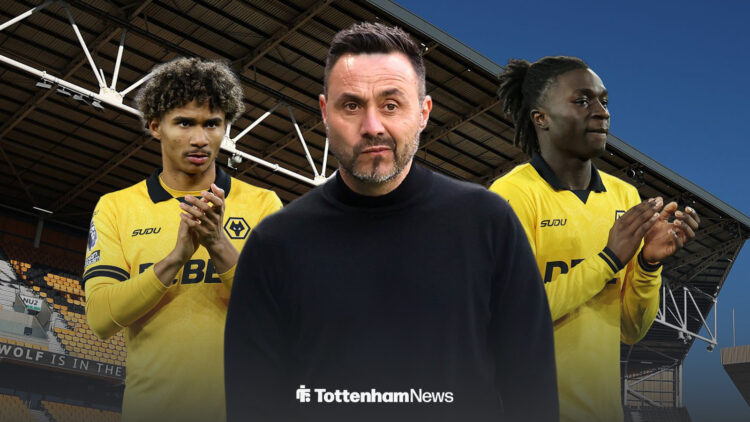 Roberto De Zerbi surrounded by Wolves players at Molineux