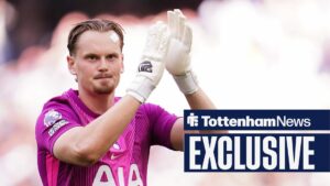Antonin Kinsky clapping in a Tottenham Hotspur shirt.