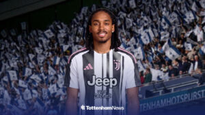 Djed Spence wearing a Juventus shirt with Tottenham Hotspur Stadium in the background